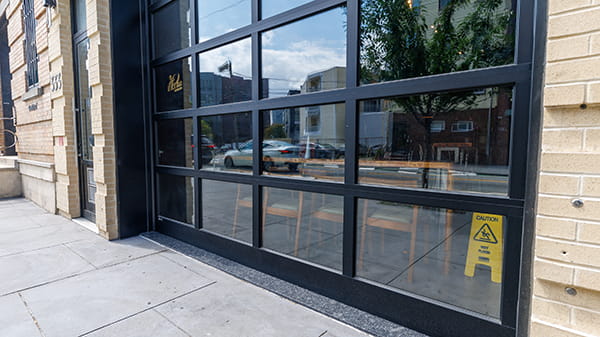 Commercial garage door company installing overhead door in New Jersey