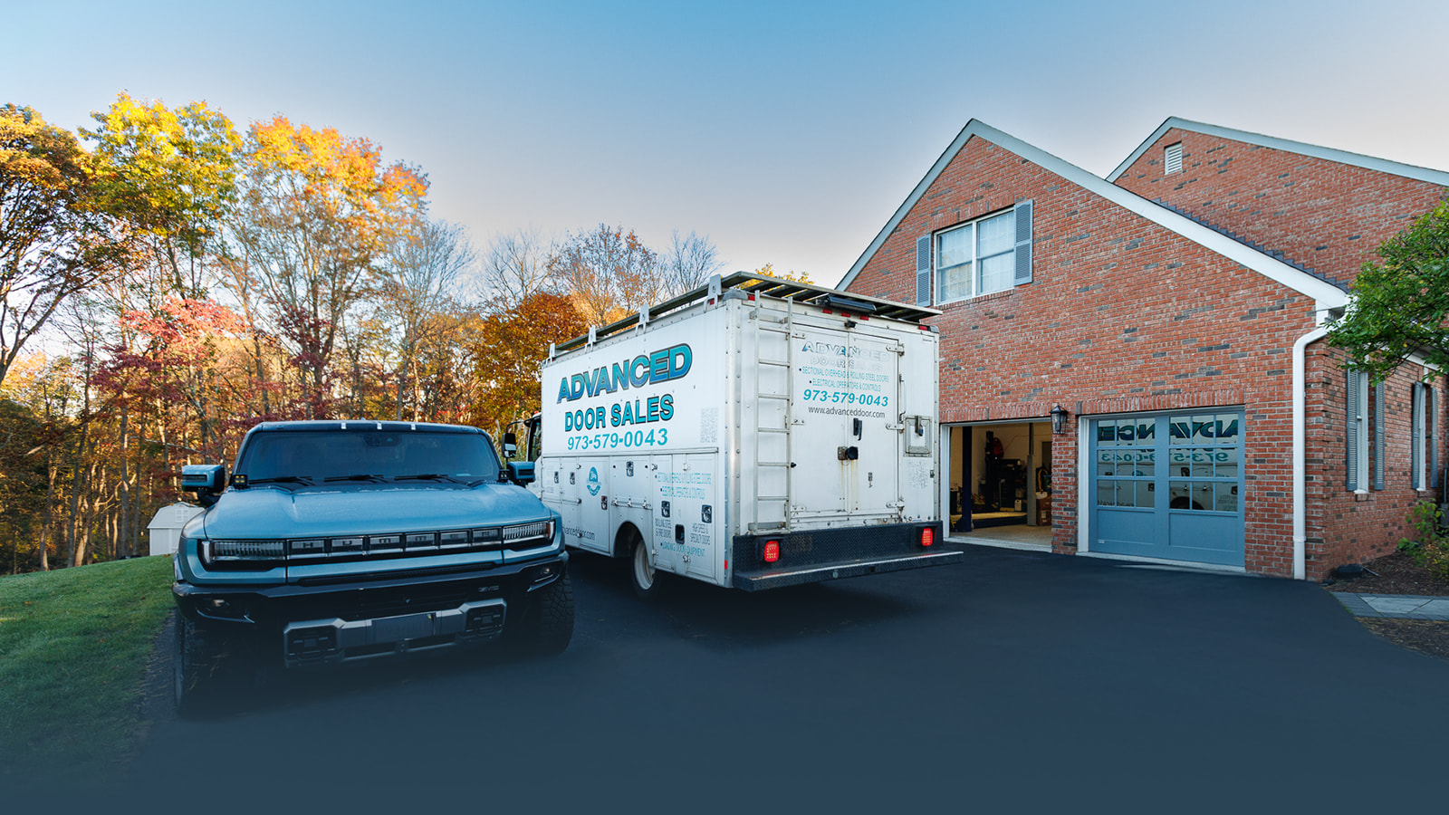 Garage door service in New Jersey with an installation truck at a residential home